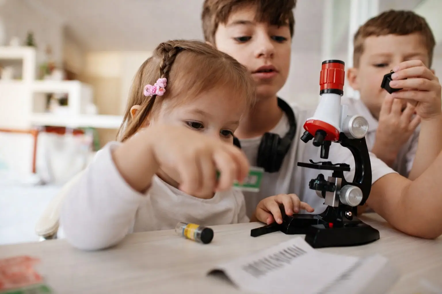 Primary students working with lab tools at Colossal Academy